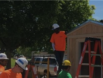 Students From Vista Nueva workijng on a bulding project on campus.