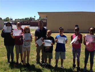 Kohler Safe School Ambassadors holding their certificates
