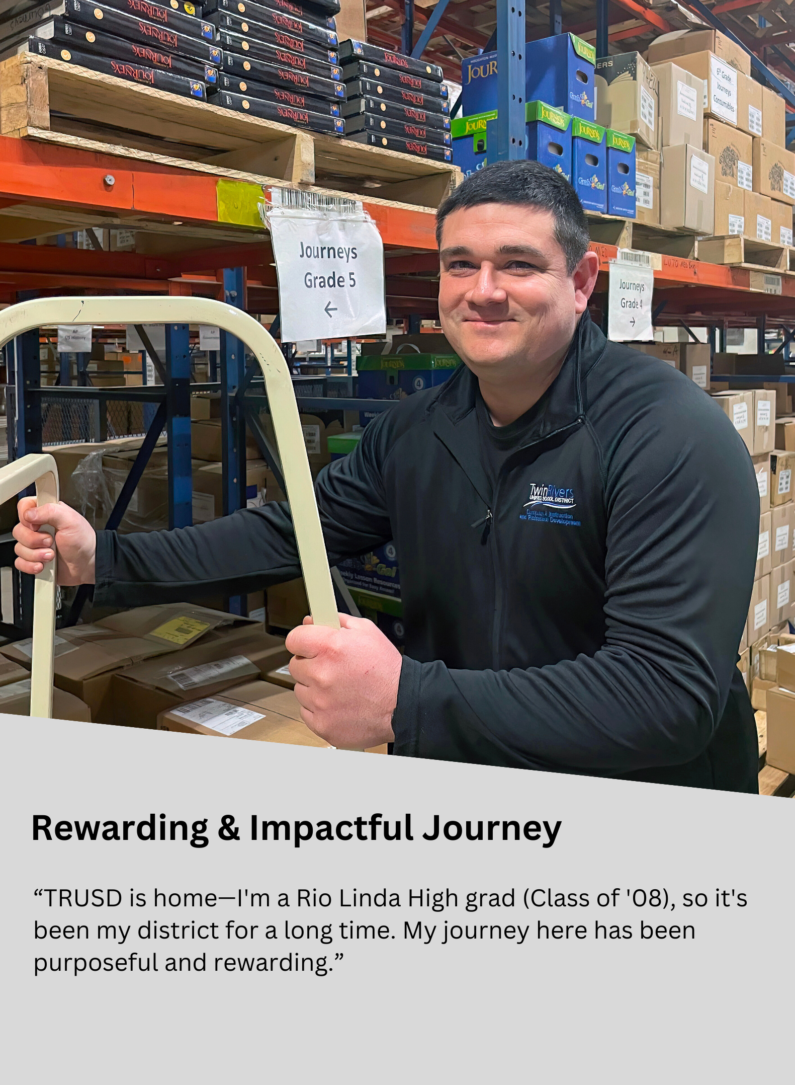 man holding on to a step ladder in warehouse smiling