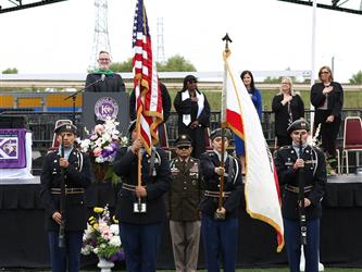 JORTC presenting American and California flags at a graduation ceremony.