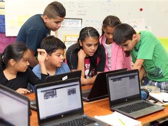 students around laptops