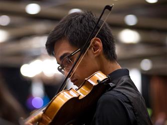 student playing violin