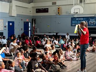 Students listening to the speaker.