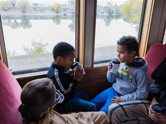 December 2025 - Students drinking hot chocolate at the Polar Express