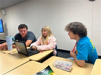 Youth Workforce Program High School Students helping elementary students