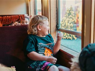 Westside after school program student looking at the window