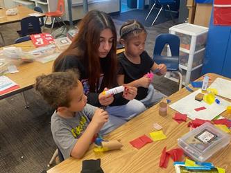 Youth Workforce Program High School Students helping elementary students