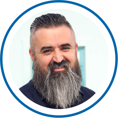 man with beard smiling